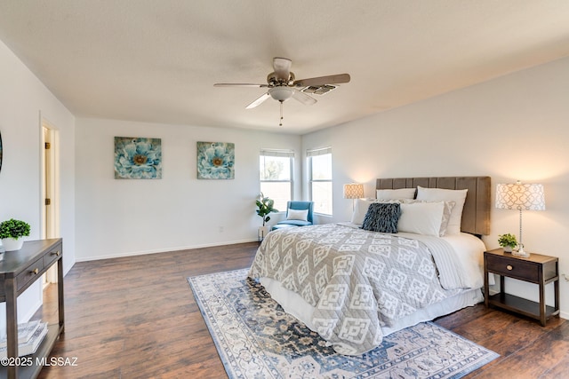 bedroom featuring dark hardwood / wood-style floors and ceiling fan