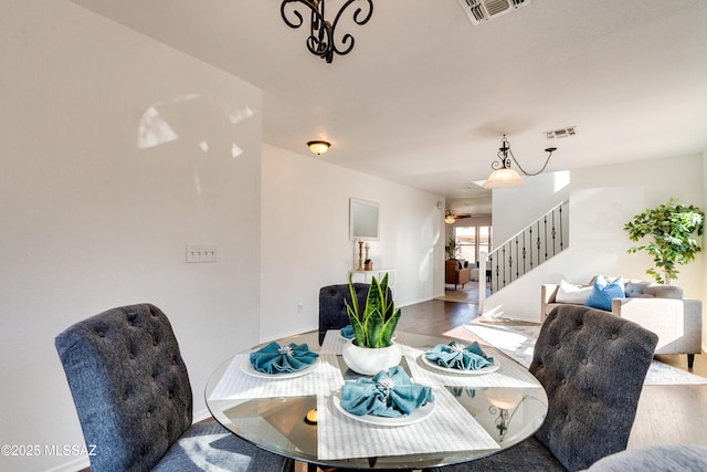 dining area featuring hardwood / wood-style flooring