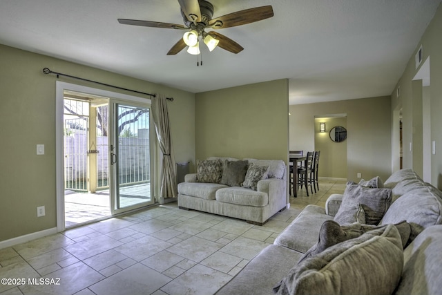 living room with ceiling fan