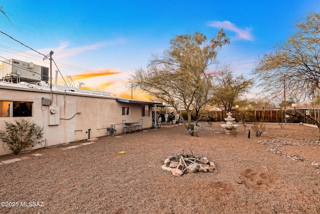 view of yard at dusk