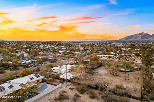 aerial view at dusk with a mountain view