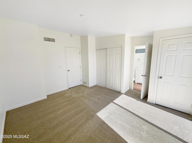 unfurnished bedroom featuring carpet floors