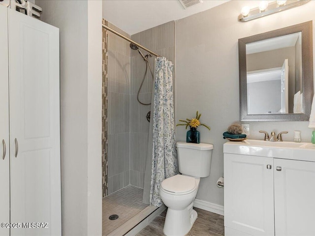 bathroom with vanity, hardwood / wood-style floors, toilet, and a shower with shower curtain