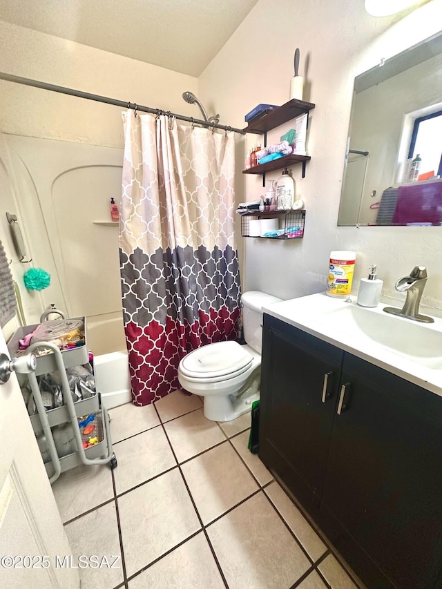 bathroom with toilet, vanity, shower / tub combo with curtain, and tile patterned floors