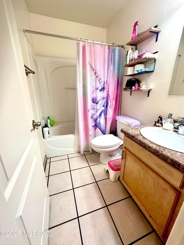 bathroom featuring toilet, shower / bath combo, vanity, and tile patterned floors