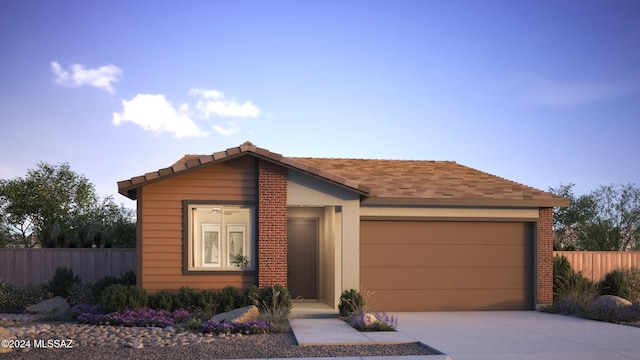 ranch-style house featuring a garage