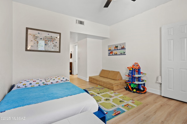 bedroom featuring ceiling fan and wood-type flooring