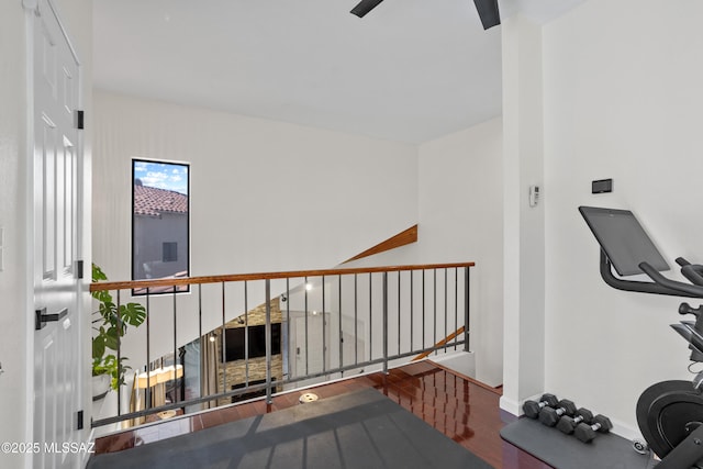 workout area with hardwood / wood-style flooring