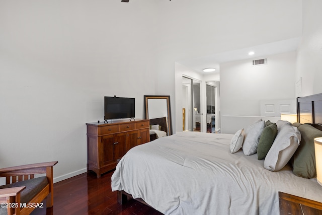 bedroom featuring dark hardwood / wood-style floors