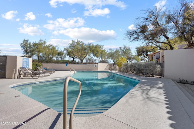 view of swimming pool featuring a patio