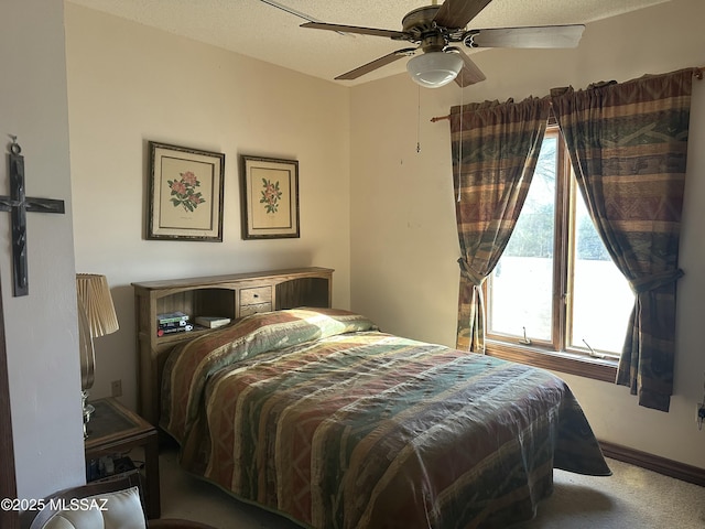 carpeted bedroom with a ceiling fan