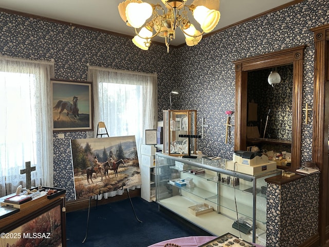 interior space featuring a notable chandelier and wallpapered walls