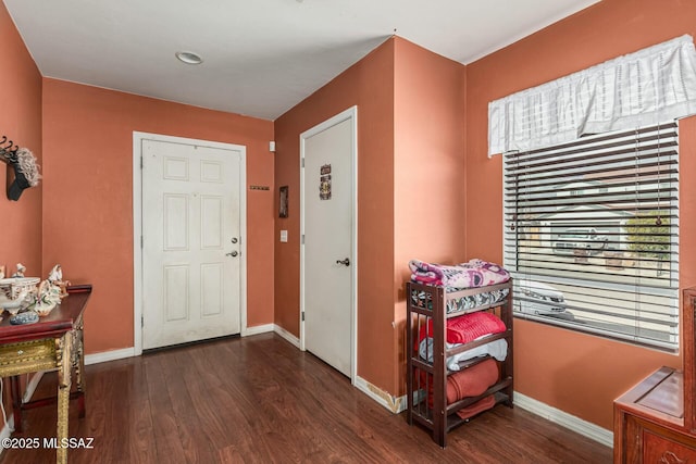 entrance foyer with dark hardwood / wood-style flooring