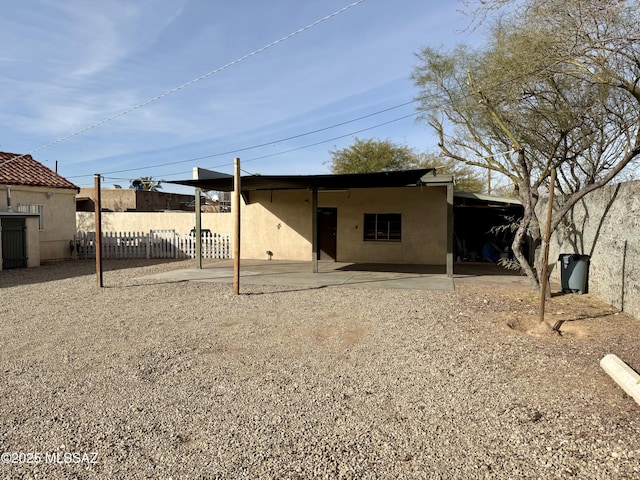 rear view of property with a patio