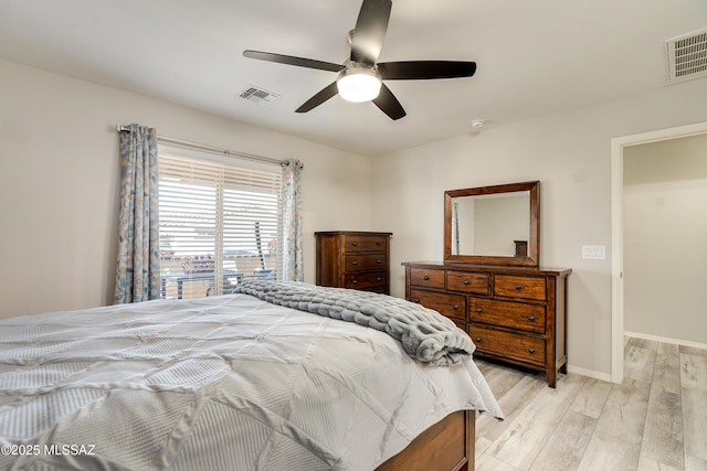 bedroom with visible vents, ceiling fan, light wood-style flooring, and baseboards