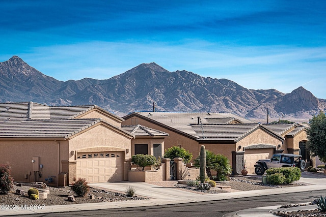 single story home with a mountain view