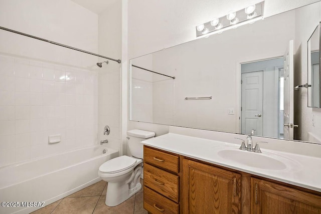 full bathroom with bathing tub / shower combination, vanity, tile patterned floors, and toilet