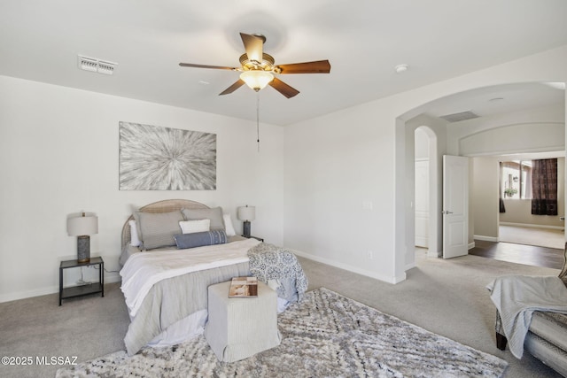 carpeted bedroom with ceiling fan