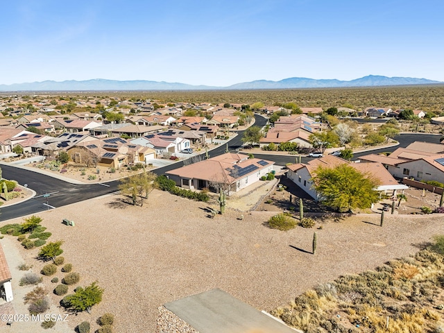 drone / aerial view featuring a mountain view