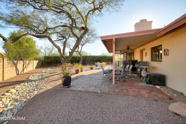 view of patio / terrace with a grill and ceiling fan