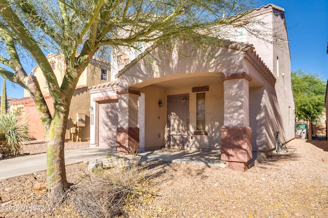 view of front of home with a garage