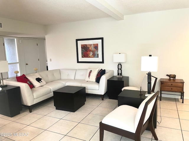 tiled living room with beam ceiling