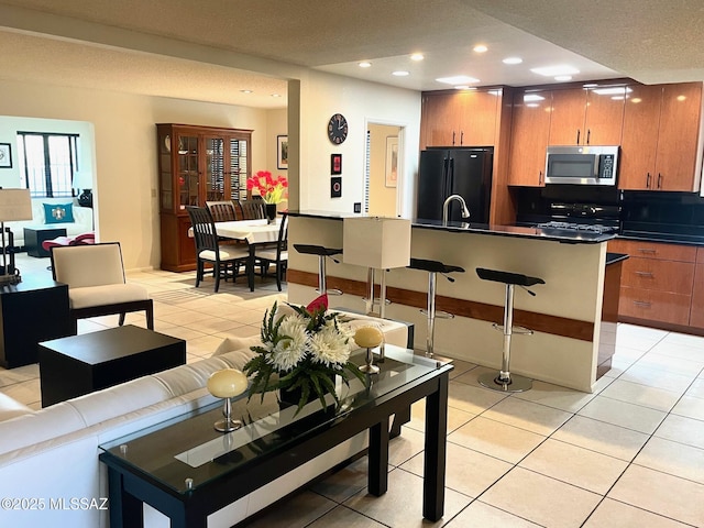 tiled living room with sink