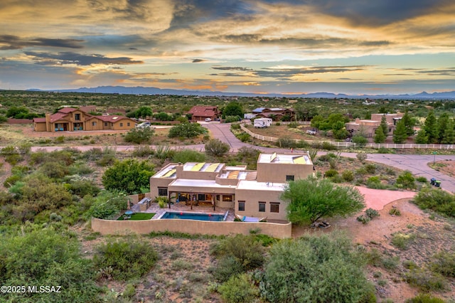 view of aerial view at dusk