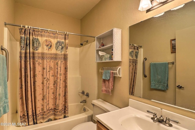 full bathroom featuring shower / bath combo, vanity, and toilet