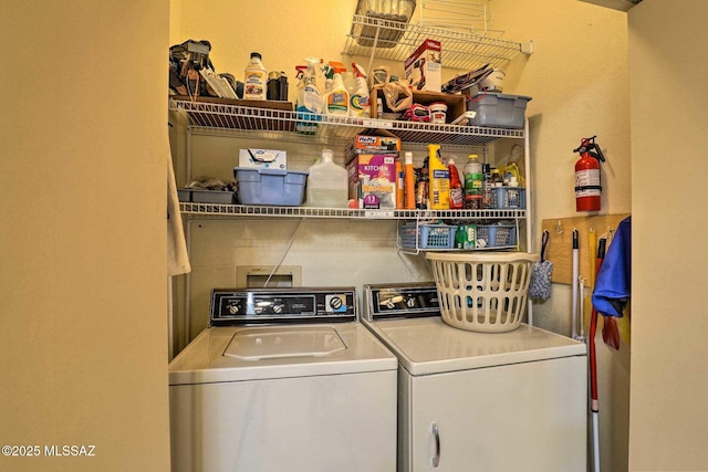 clothes washing area featuring laundry area and independent washer and dryer