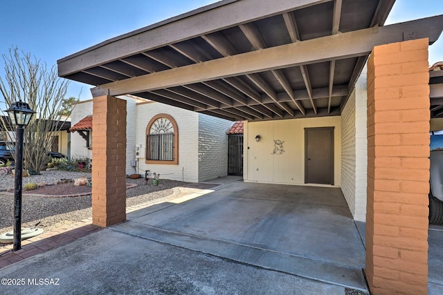 view of patio / terrace featuring a carport