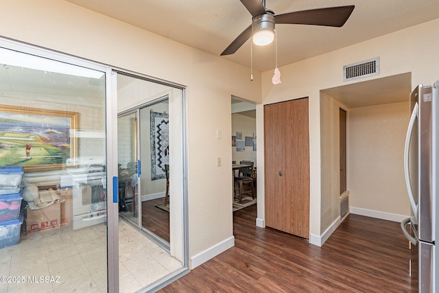 interior space featuring hardwood / wood-style flooring and ceiling fan