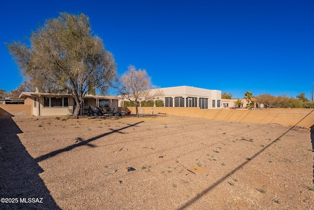 view of yard featuring a sunroom