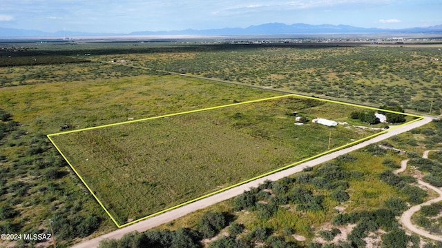 drone / aerial view featuring a mountain view