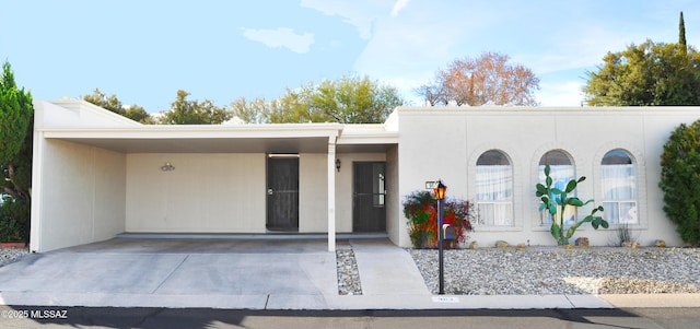 view of front of house featuring a carport