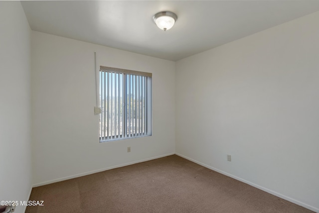 unfurnished room featuring carpet floors