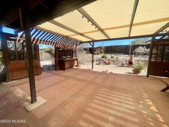 view of patio / terrace featuring a pergola