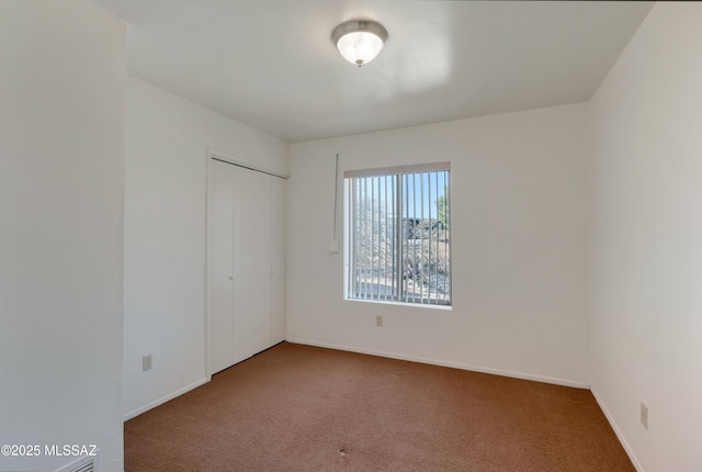 view of carpeted spare room