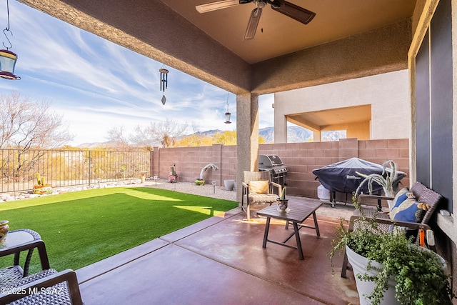 13774 N High Mountain View Pl, Tucson, AZ 85739 - fenced backyard featuring ceiling fan, a patio area, and a grill