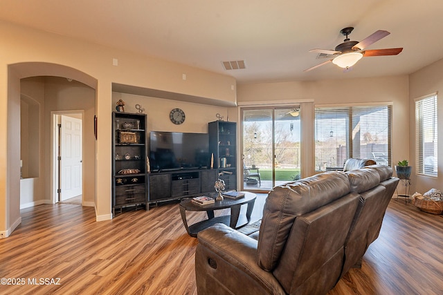 13774 N High Mountain View Pl, Tucson, AZ 85739 - living room with wood finished floors, healthy amount of natural light, and ceiling fan