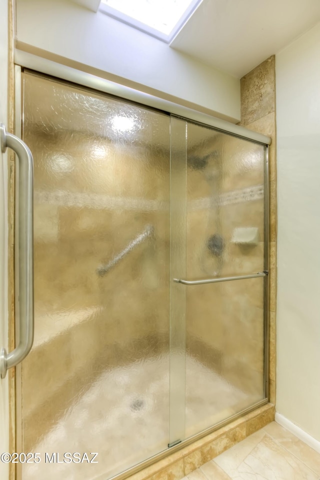 bathroom featuring an enclosed shower