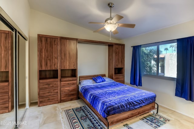 bedroom with vaulted ceiling and ceiling fan