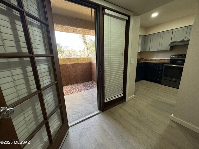 bathroom with hardwood / wood-style flooring