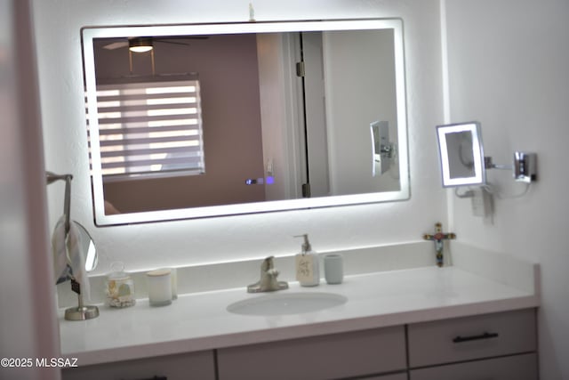 bathroom featuring vanity and ceiling fan