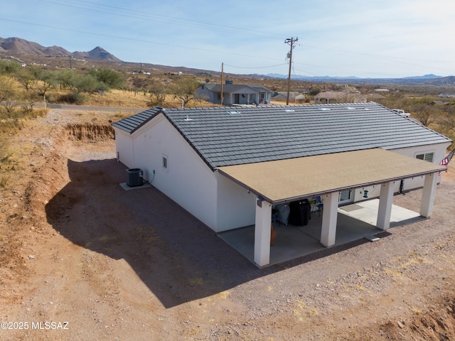 drone / aerial view featuring a mountain view