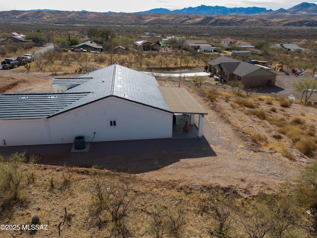 drone / aerial view featuring a mountain view