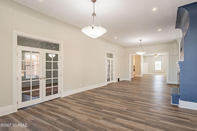 interior space with french doors and dark hardwood / wood-style floors