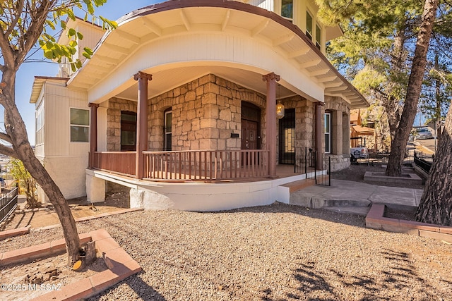view of front of property featuring covered porch