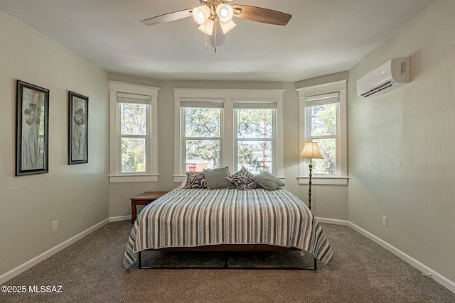 bedroom with ceiling fan, a wall mounted air conditioner, and carpet
