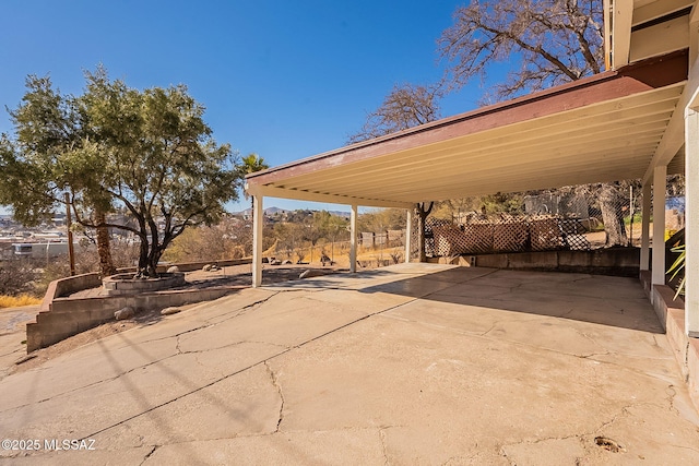 view of patio / terrace featuring a carport